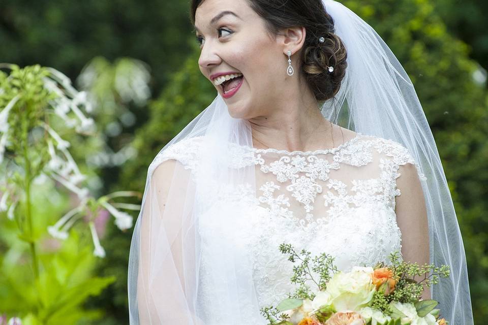Bride laughing at groom