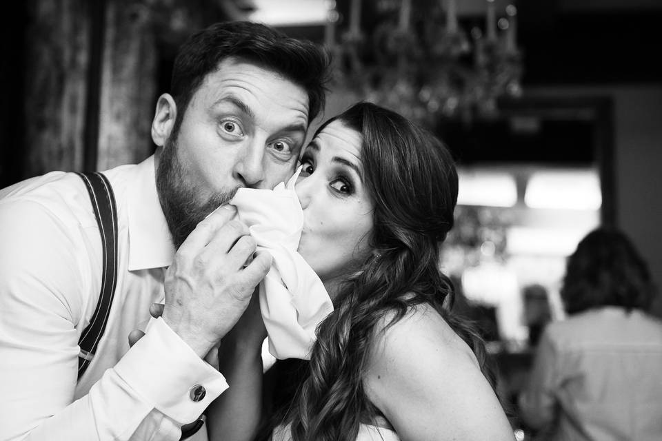 Bride & groom sharing a tissue