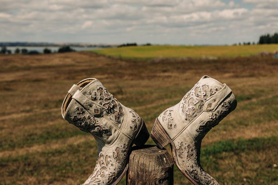 Cowboy boots on a post