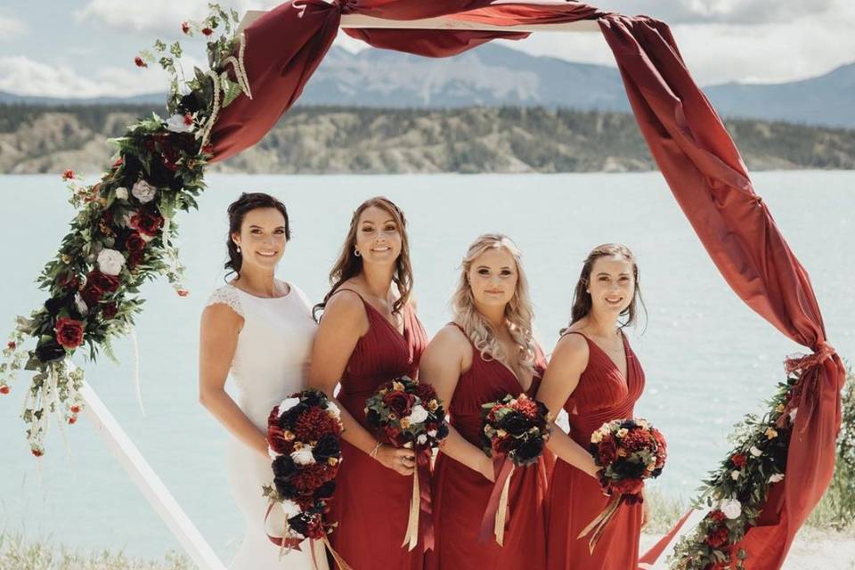 Burgundy, navy, and white bouquets