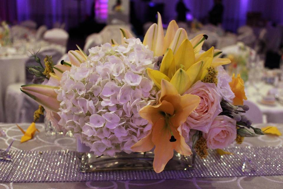 Yellow centerpiece with lilies