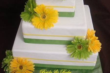 1295048268536-WhitewithflowersandribbonFauxCake.jpg