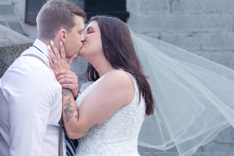 Bride and groom kissing