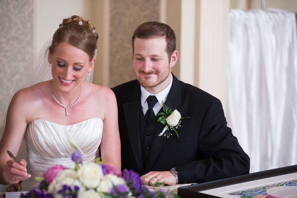 Signing the marriage license