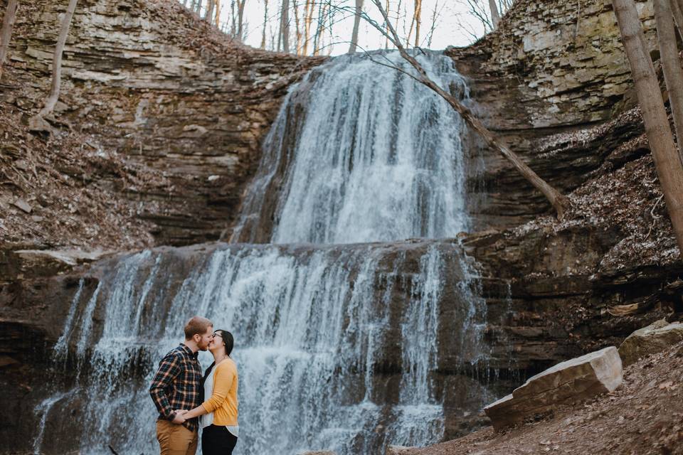 Kiss by the waterfall