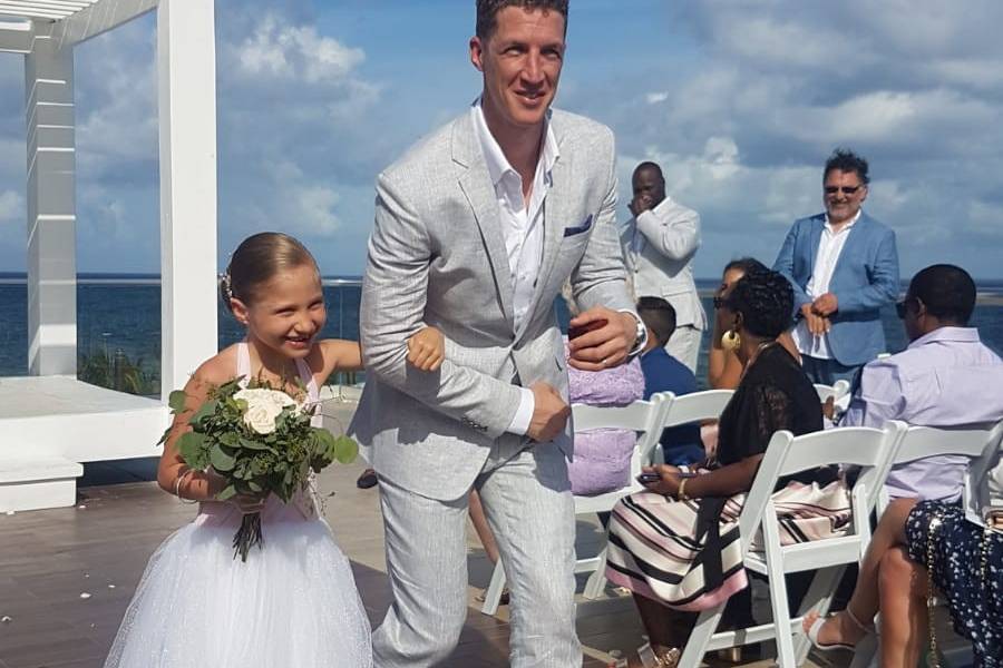 Groomsman with flower girl