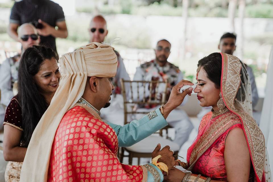 Bride wiping off tears