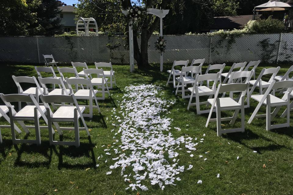 Aisle with white petals