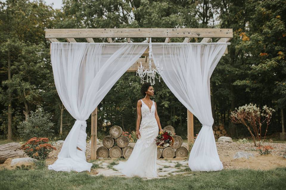 Standing under the pergola