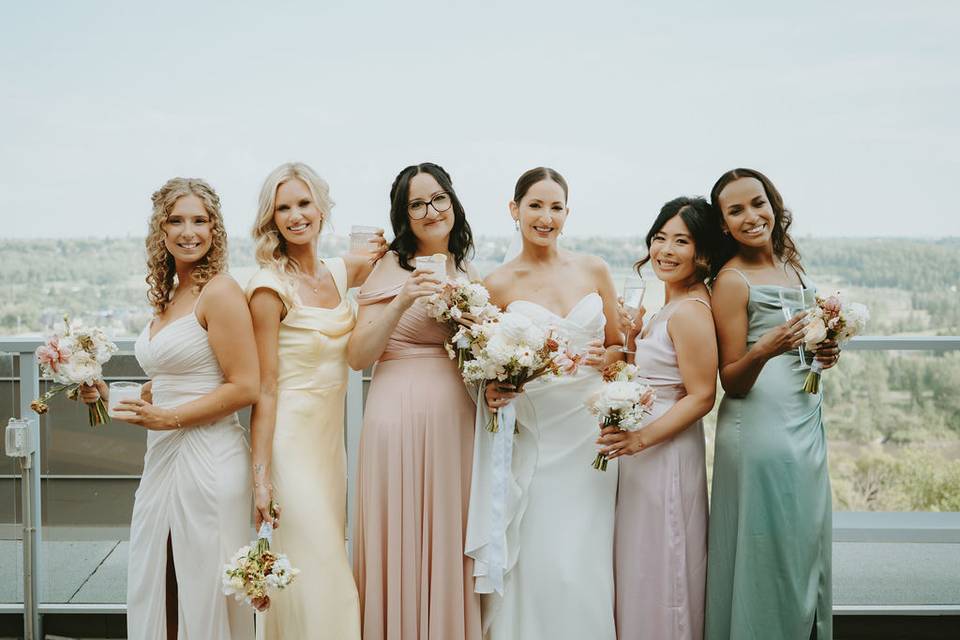 Bridal party photos on balcony