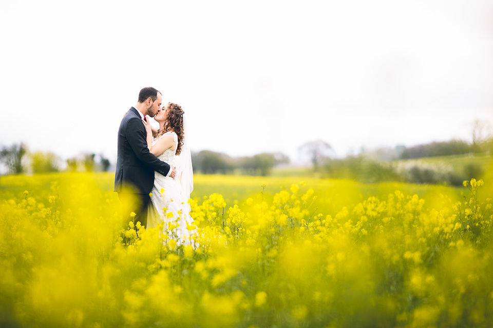 Bride and Groom in field