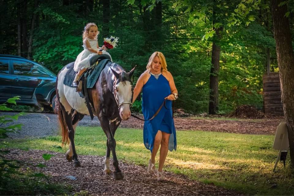 Flower girl on horse