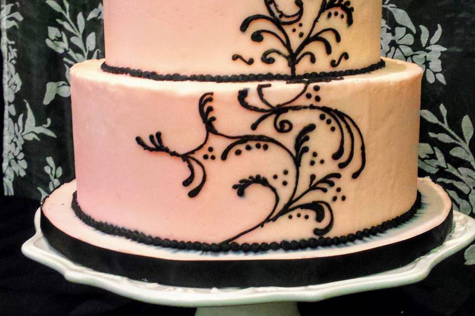 Pink with black scroll work