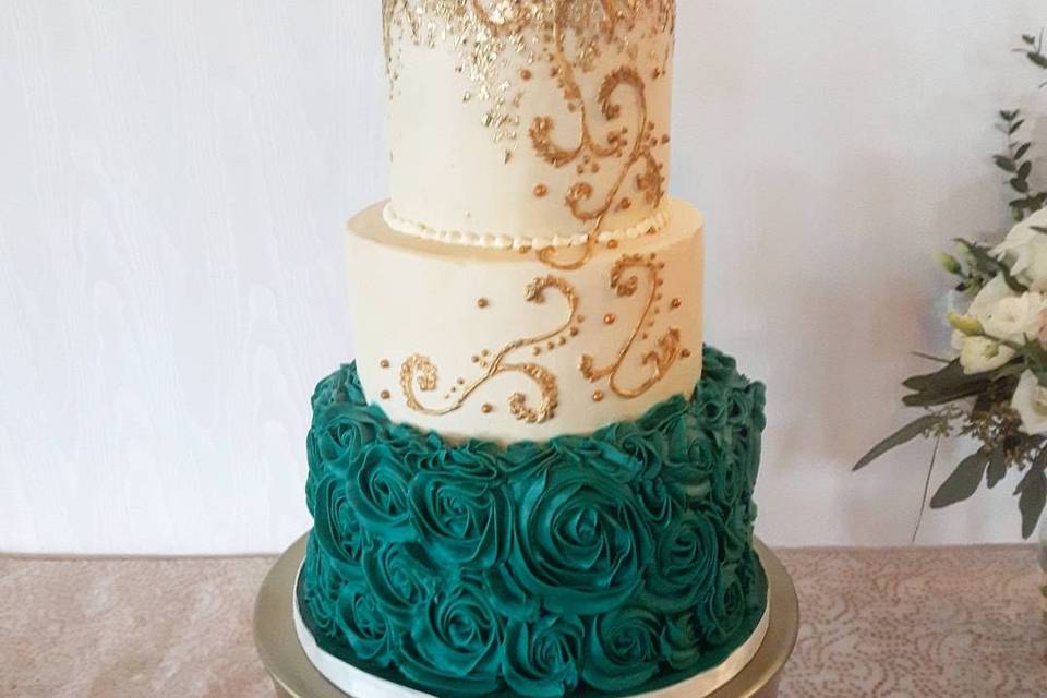 Gold leaf, piping & rosettes