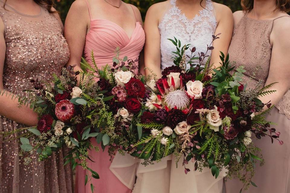 Burgundy and blush with protea
