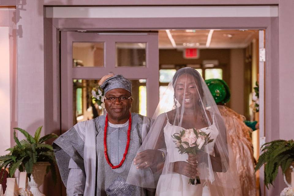 Brides's father walking her