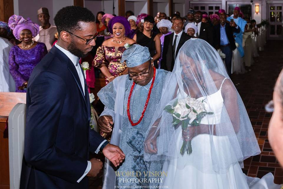 Father handing over bride