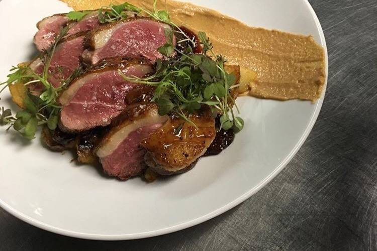 Seared duck breast plated