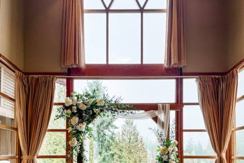 Ceremony arbor and florals