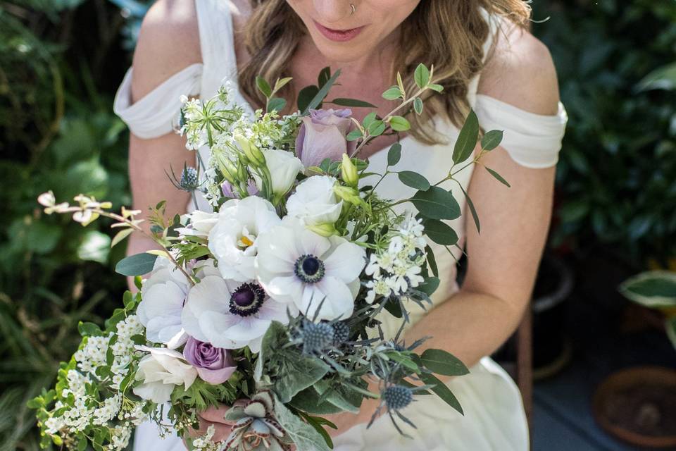 Bridesmaids with pink gerbera