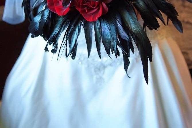 Red rose black feather.jpg