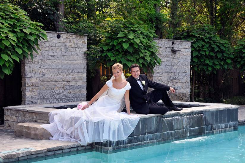 Couple posing by the pool