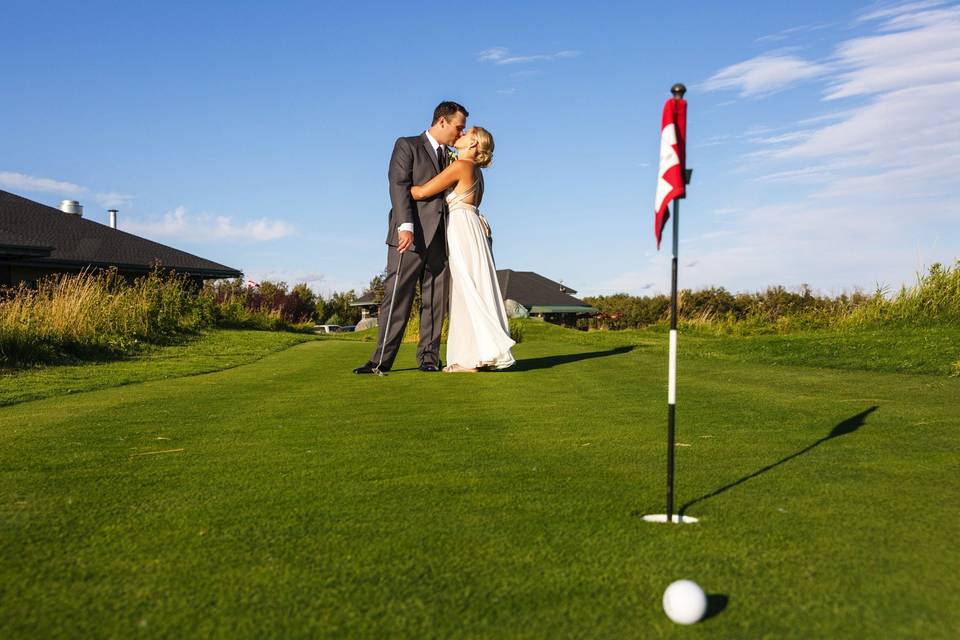 Putting course bride and groom