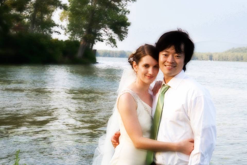 Wedding couple at rustic lakes
