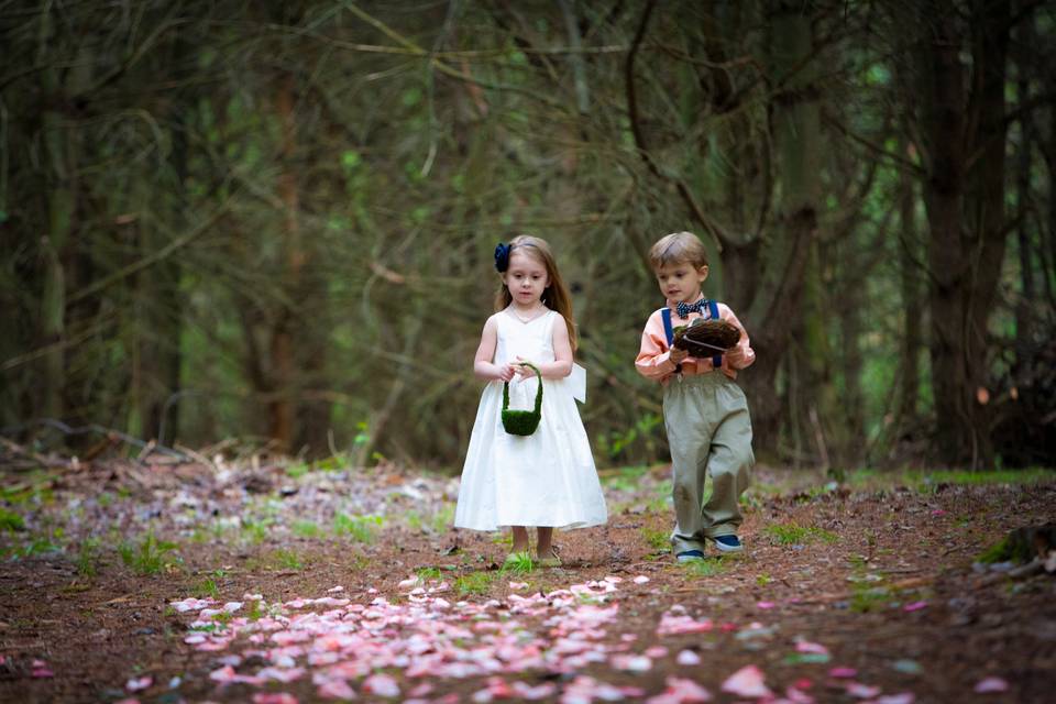 Young flower girl and ring bea