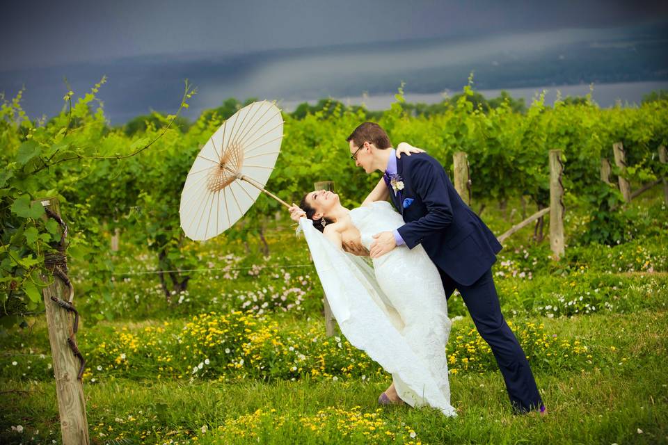 Vineyard wedding couple dip in