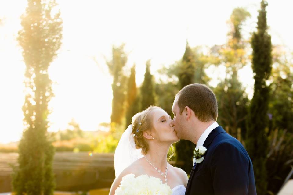 Summer backlit bridal couple k
