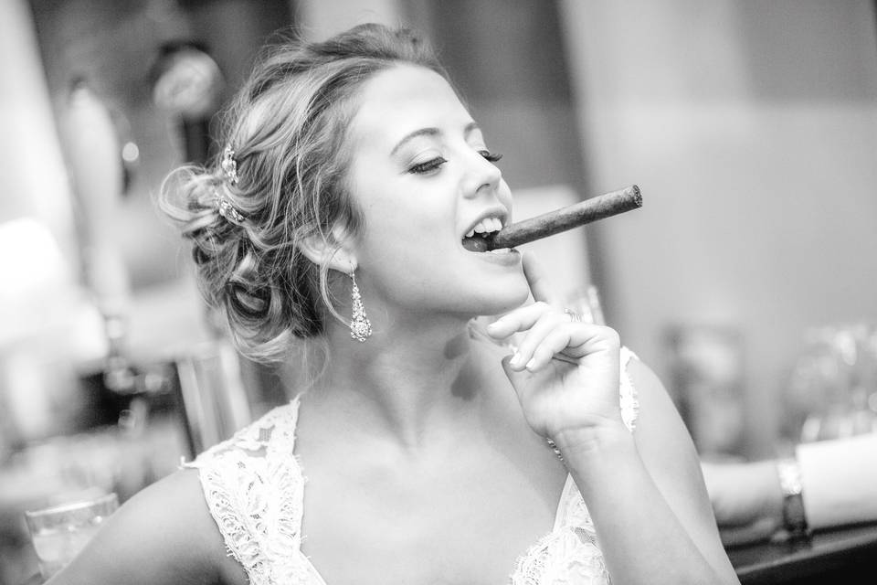 Bride having fun with cigar