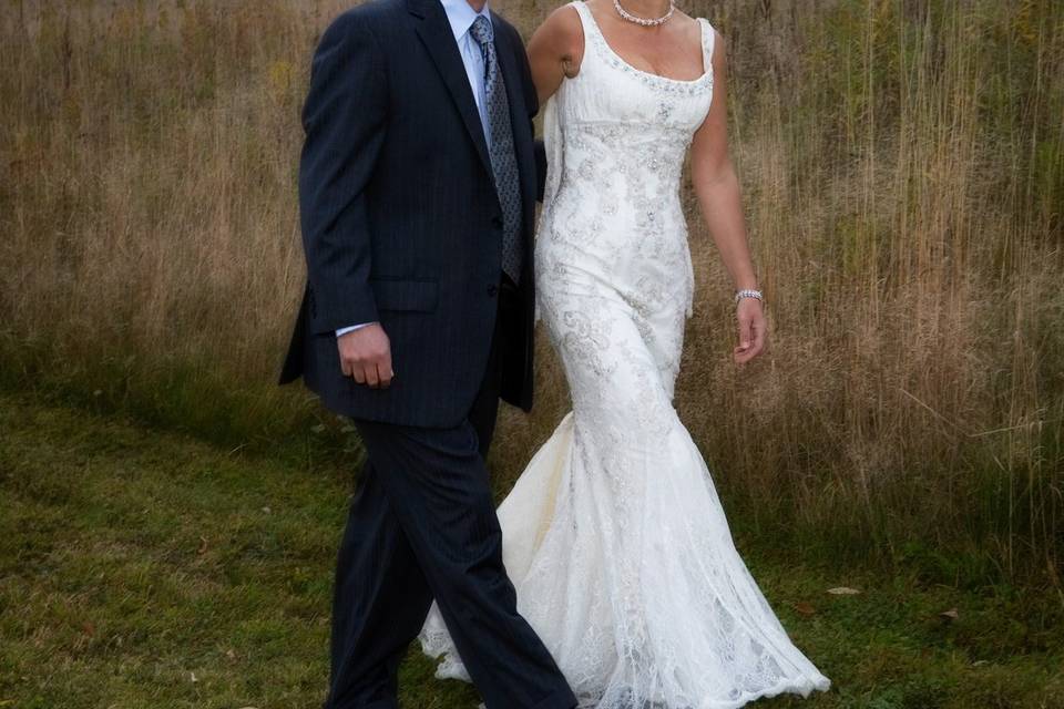 Wedding couple walk in fall wo
