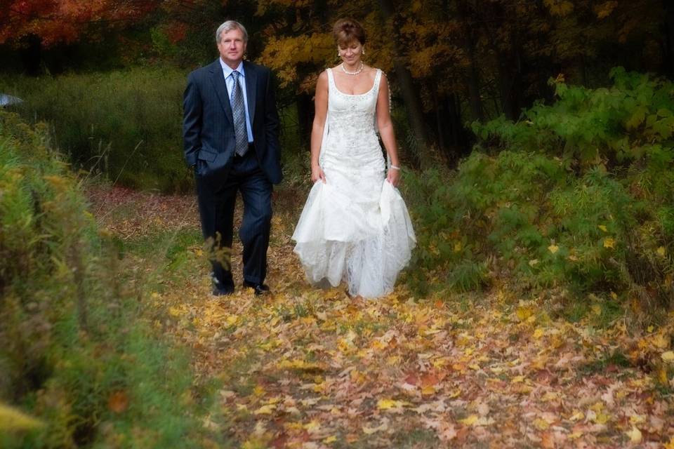 Bridal couple walk path with f