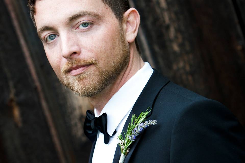 Dramatic groom closeup with un