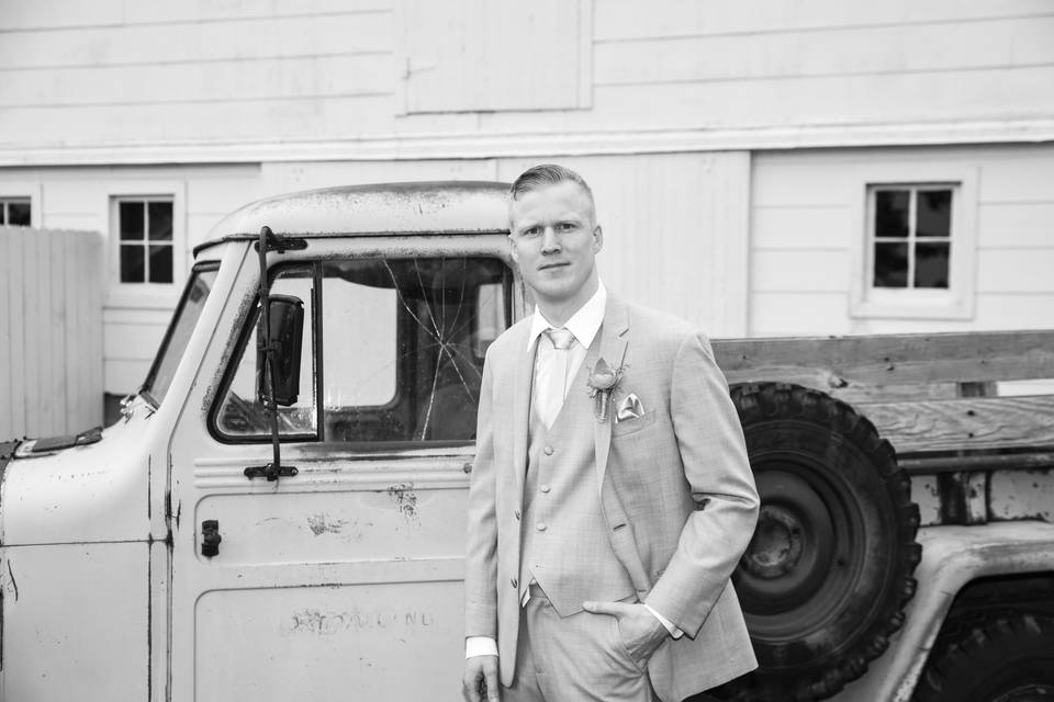 Groom portrait - rustic farm