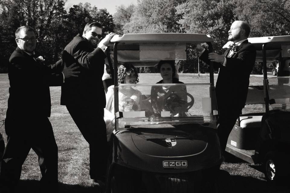 The groomsmen and a golf cart
