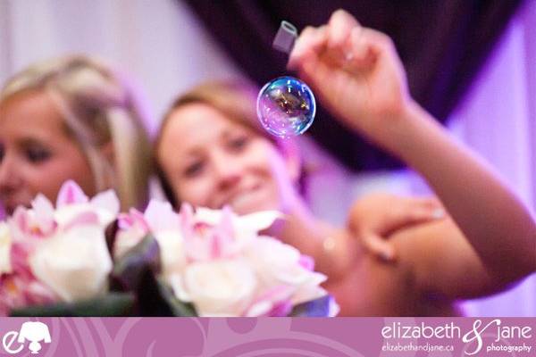 Blowing bubbles at the reception.jpeg