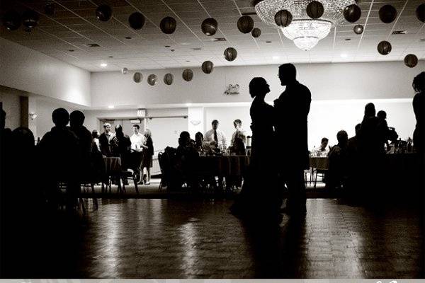 Wedding Photos? silhouette photo of the bride and groom dancing at their wedding reception.jpeg