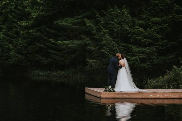 Bride and groom on dock