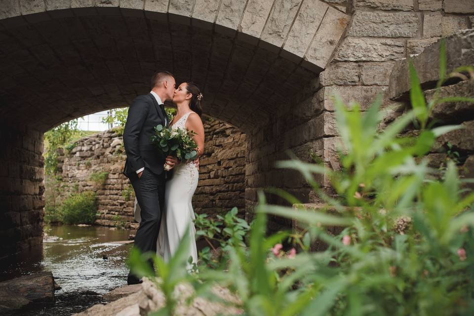 Bride & Groom under a bridge