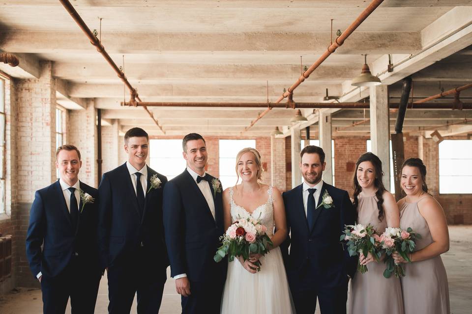 Wedding party in factory space