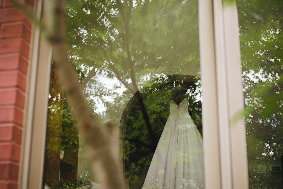 Wedding dress through window