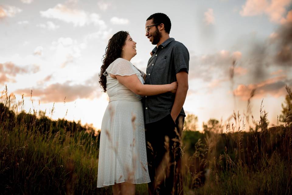 Engagement photo in meadow