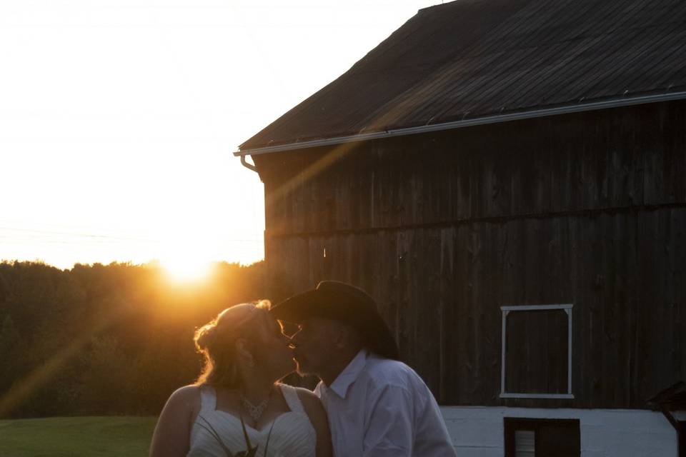 Wedding kiss at sunset