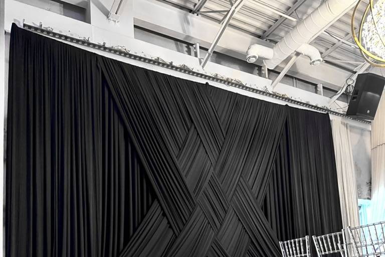 Cross curtain backdrop