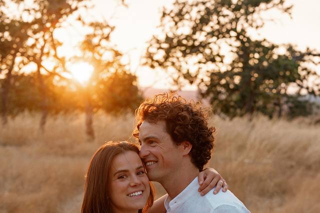 Couple embracing at sunset