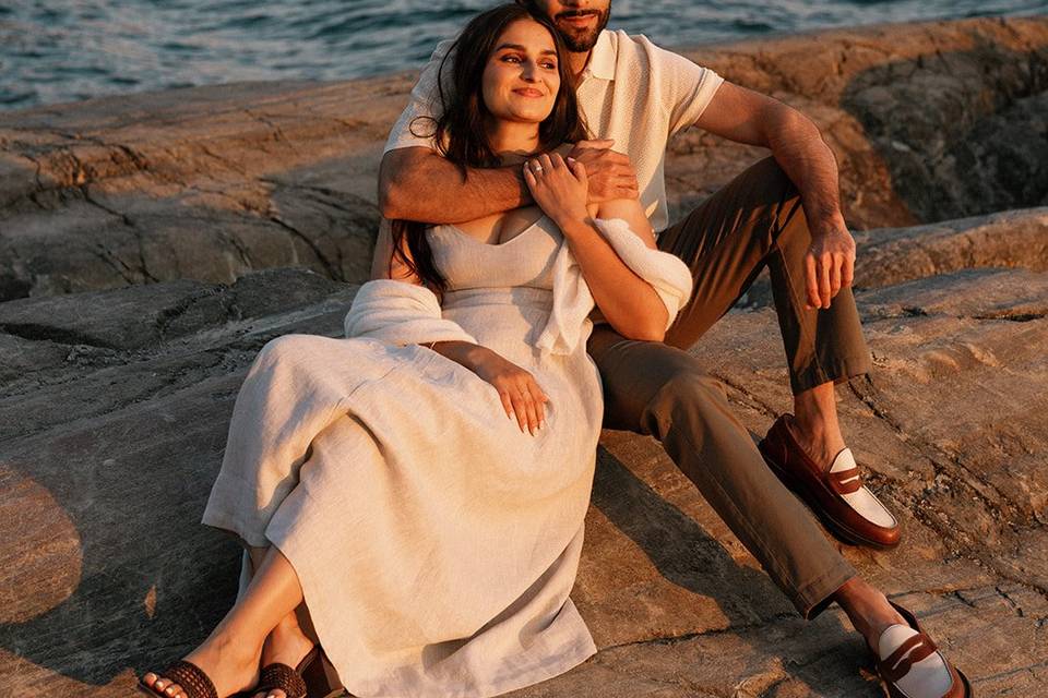 Couple relaxing at sunset