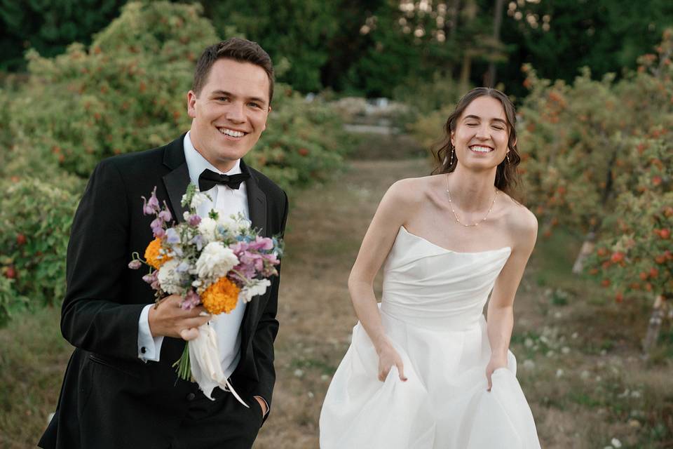 Bride and groom laughing