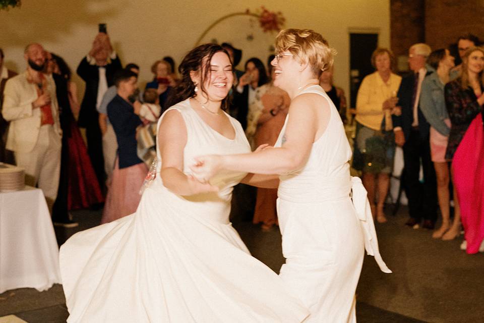 Brides sharing first dance